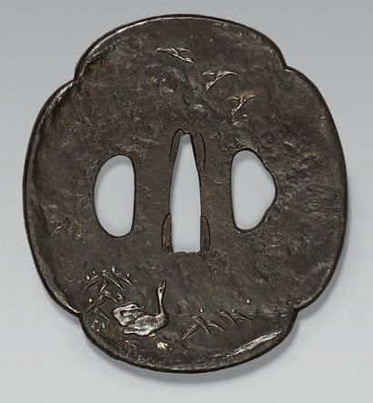 null Tsuba en fer à décor d'oies et branches près d'un cours d'eau.
Epoque EDO (1603-1868)...