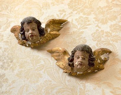 null Paire de têtes d'angelots en bois sculpté, doré, peint ou laqué au naturel.
XVIIIème...