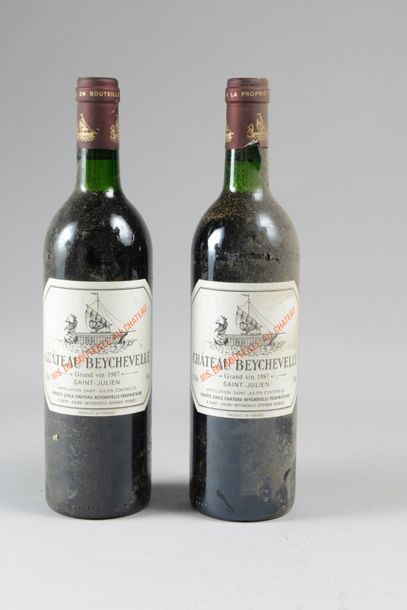null 2 bouteilles Château BEYCHEVELLE, 4° cru Saint-Julien 1987 (ets, J)