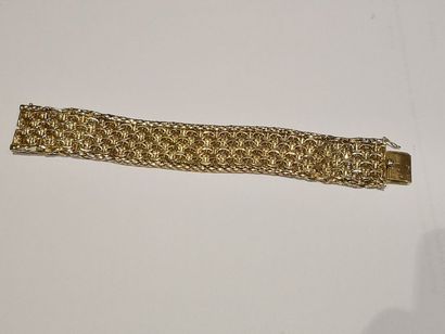 null Bracelet ceinture en or 750°/°° à décor tressé.
Poids: 69.20 g.