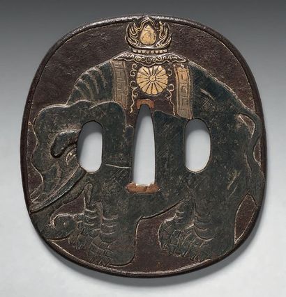 JAPON TSUBA en fer à décor en léger relief d'un éléphant en nunome-zogan d'argent,...