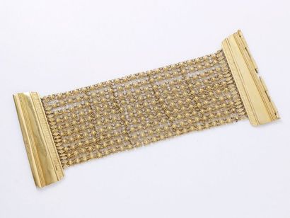 null Bracelet manchette en or 750 millièmes, composé de 10 rangs de chaîne à décor...