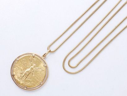 null Pendentif porte pièce en or 750 millièmes, orné d’une pièce de 50 pesos datée...