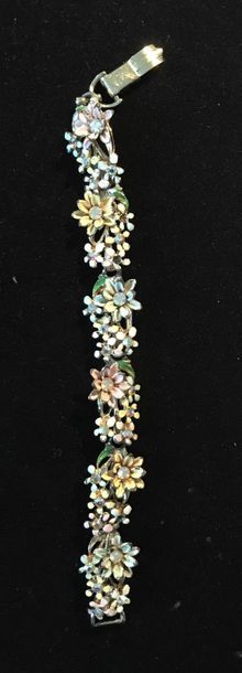 null Bracelet en métal à décor floral réhaussé d’émail polychrome et de strass multicolores....
