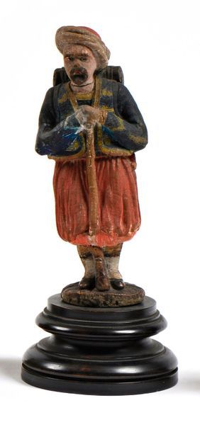 null Polychrome plaster subject representing a zouave. Under the terrace it bears...