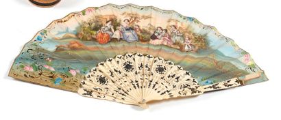 null Silk fan painted with a polychrome village dance scene. Engraved wood strands...