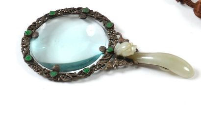 null Face to hand in silver, jade and jadeite around the rim decorated with bats,...