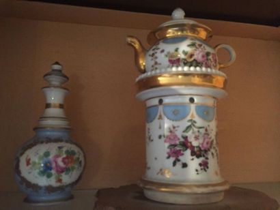 null Porcelain teapot with gold and polychrome flower decoration. (missing) A covered...