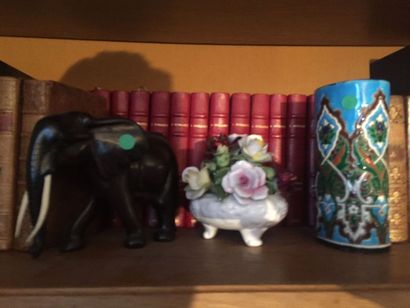 null Longwy enamel vase, a flowered bowl in German porcelain, an elephant in exotic...