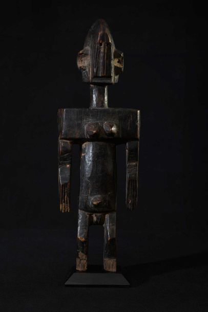 null BAMBARA (Mali). Statuette féminine les bras le long du corps. Manque les pieds,...