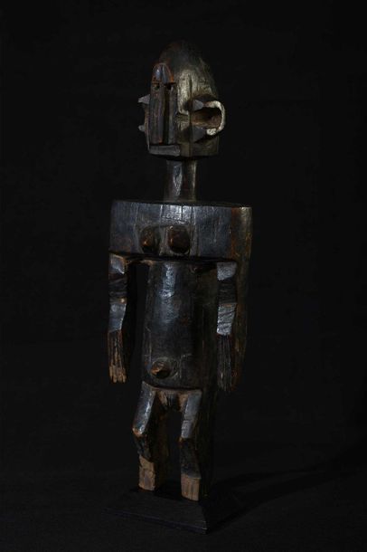 null BAMBARA (Mali). Statuette féminine les bras le long du corps. Manque les pieds,...