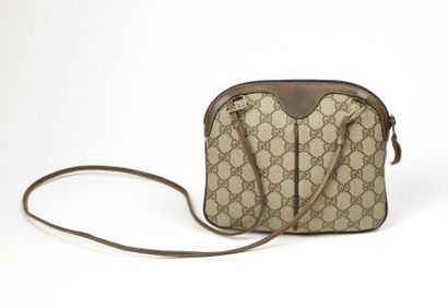 null GUCCI : sac bandoulière en toile enduite monogrammée et cuir kaki, double zip...