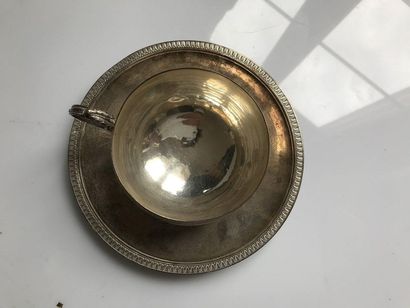 null Silver cup and saucer decorated with a frieze of palmettte, CG or CS ciphered...