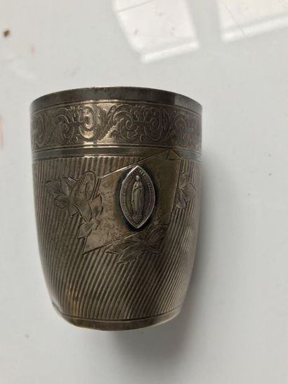null Silver goblet with stris decoration, foliated frieze and a cartouche with medallion...