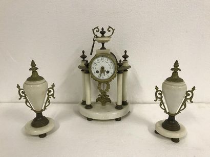 null Portico clock in white marble, white enamelled dial, dampened vase, gilded bronze...