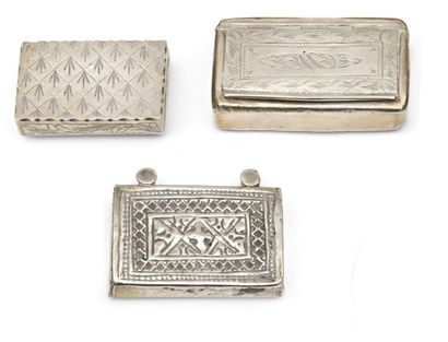 null Case and two rectangular silver boxes with engraved foliage decoration. Weight...