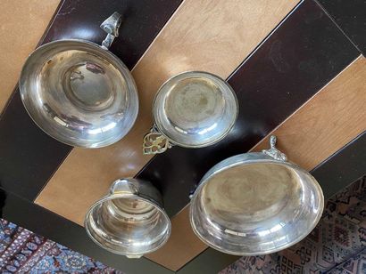 null Lot in silver plated metal including: champagne bucket, two-handled goblet decorated...