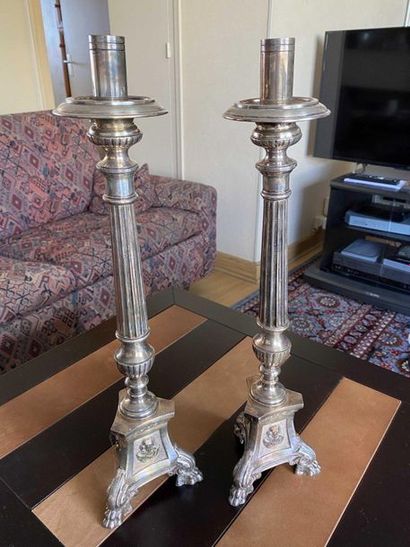 null Pair of silver plated copper candle sticks. Height 50cm