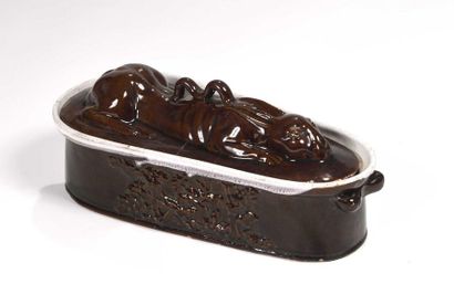 null Hare terrine in brown glazed clay, the lid in the shape of a hare (crack), the...