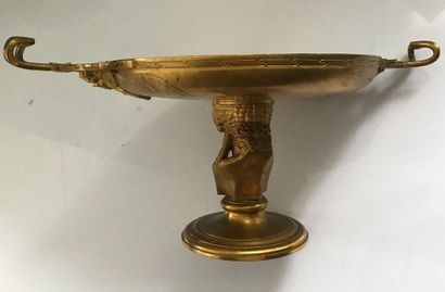 null BARBEDIAN Cup in gilt bronze decorated with a medallion representing eagles....