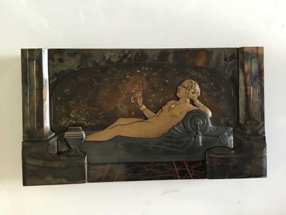 null GRUNWEISER, metal plate, gilded and patinated bronze representing a woman lying...