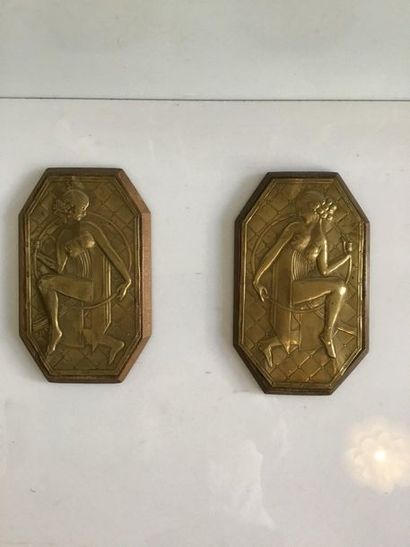 null VERDUK, pair of embossed brass plates decorated with women with hoops.

Circa...