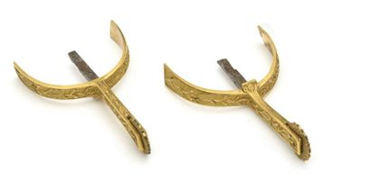 null Pair of gilt bronze spurs chiselled with oak branches, the castors with floral...