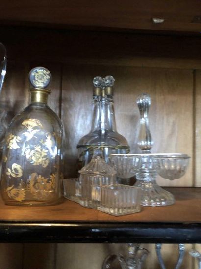 null Three gilded metal carafons, one 18th century gold bottle.

A mustard maker...