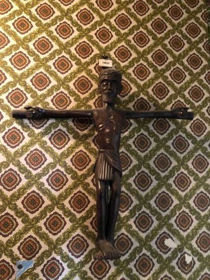 null A carved wooden crucifix.