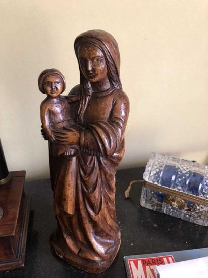 null Virgin and child in natural wood

In the taste of the seventeenth century