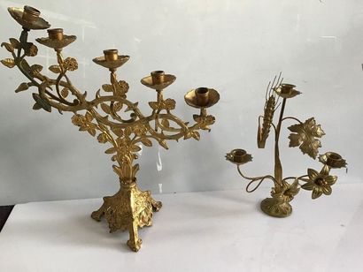 null Gold-plated metal candelabra with five light arms.

Joined a candelabra with...