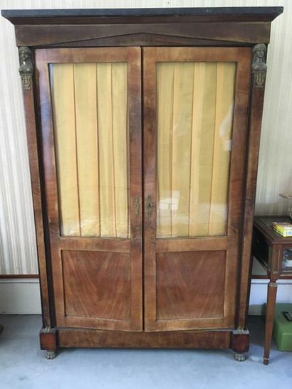 null Mahogany cupboard, partly glazed, the uprights in pilasters decorated with ...