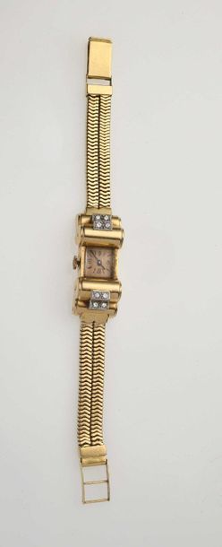null 33 Tank style city watch in 18K 750 mils yellow gold with mechanical movement.18K...