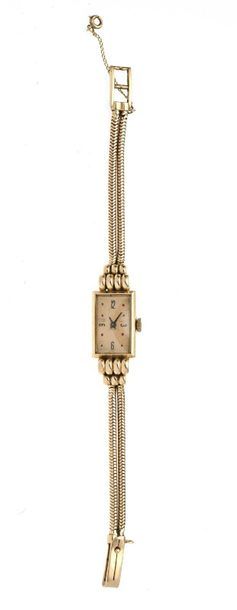null 34 18K 750 mils yellow gold city watch with mechanical movement.18K yellow gold...