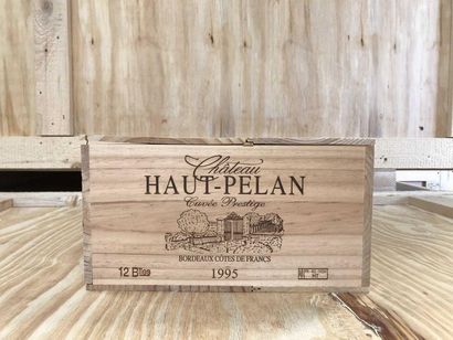 null 12 Ends. Côtes de Francs, Château Haut Pelan, 1995. Wooden case