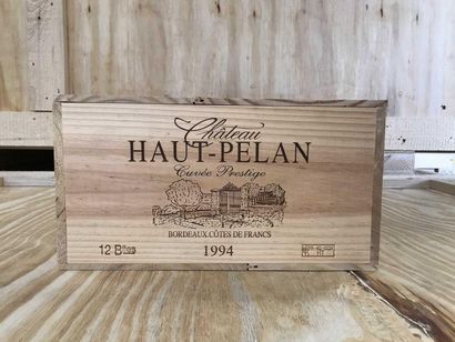 null 12 Bout. Côtes de Francs, Château Haut Pelan, 1994. Caisse bois