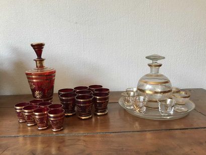 null Two water glasses in red tinted glass, gold edging, some mismatched
