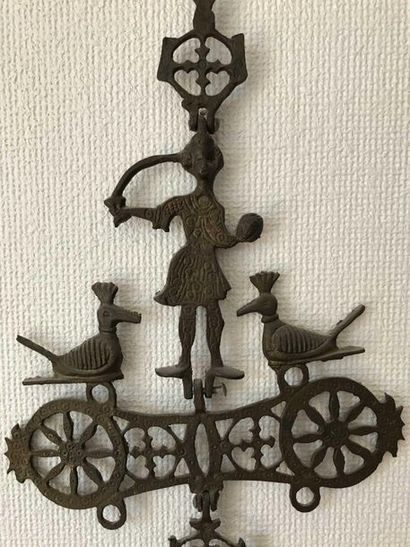 null Popular art. Decorative element made of worked and openwork metal, figure and...