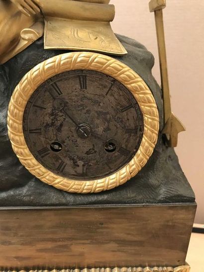 null Clock in bronze, metal and gilt metal representing an explorer on his rock,...
