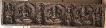 null Wooden bas-relief carved in round wood representing Ganesh, deities and characters....