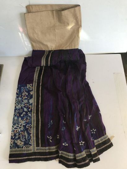 null Purple Chinese skirt with blue embroidery. 

(Wears)