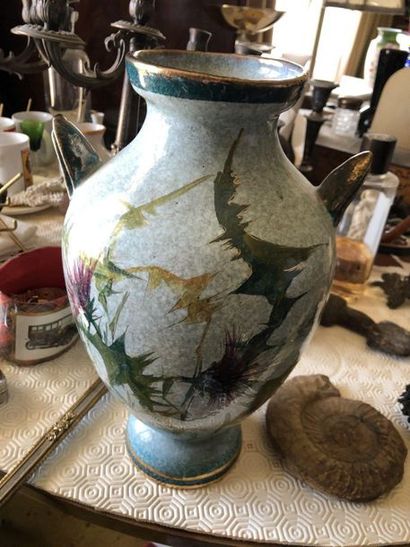 null Baluster vase decorated with flowers and stylised foliage

Signed and located...