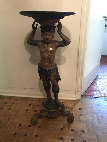 null Wooden polychrome saddle representing an Indian on a tripod base Height: 100...