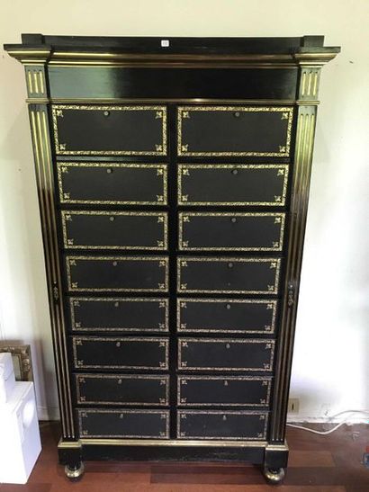 null Filing cabinet in black lacquered wood, the uprights with dark golden brass...