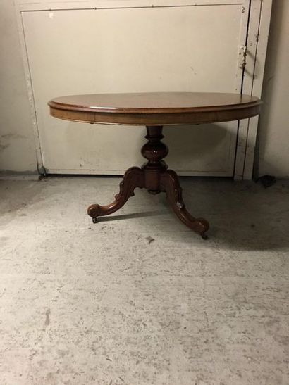 null Round table with central tripod base with moulded decor.XIXth century