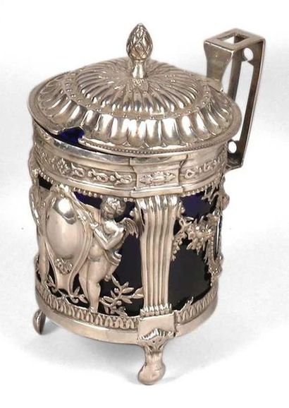 null 176 Silver tripod mustard pot with openwork putti decoration framing a cartouche...
