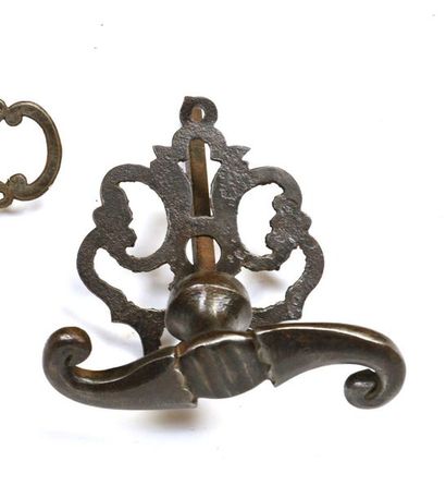 null 203 Beautiful and large handle with scroll decoration, on die-cut plate. 18th...