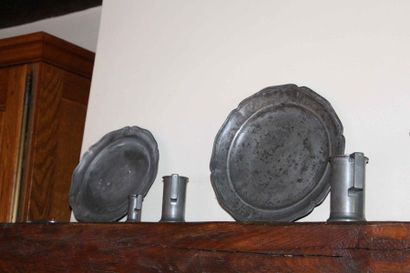 null Set of pewter and brassware including: plates, measures, jug and saucepans,...