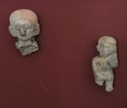 null Travel souvenir: two terracotta head ocarinas and three terracotta subjects...