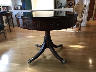 null Mahogany pedestal table with a central quadripod was finished with gilt bronze...
